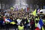 People march during a yellow vest (gilets jaunes) anti-government demonstration in the northern city of Lille on December 29, 2018. - Police fired tear gas at yellow vest demonstrators in Paris on December 29 but the turnout for round seven of the popular protests that have rocked France appeared low. The yellow vests (gilets jaunes) movement in France originally started as a protest about planned fuel hikes but has morphed into a mass protest against Presidents policies and top-down style of governing. (Photo by FRANCOIS LO PRESTI / AFP)
