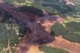 Handout picture released by the Minas Gerais Fire Department showing an aerial view taken after the collapse of a dam, which belonged to Brazils giant mining company Vale, near the town of Brumadinho in southeastern Brazil, on January 25, 2019. - A dam in southeast Brazil collapsed Friday, unleashing a torrent of mud that killed an as-yet-undetermined number of people living in an area close to the city of Belo Horizonte, a local fire service official said. Emergency services were still responding to the situation in and around Brumadinho and did not yet have a precise toll, the official told AFP. (Photo by HO / Minas Gerais Fire Department / AFP) / RESTRICTED TO EDITORIAL USE - MANDATORY CREDIT AFP PHOTO / MINAS GERAIS FIRE DEPARTMENT - NO MARKETING NO ADVERTISING CAMPAIGNS - DISTRIBUTED AS A SERVICE TO CLIENTSEditoria: DISLocal: BrumadinhoIndexador: HOSecao: accident (general)Fonte: Minas Gerais Fire DepartmentFotógrafo: STR
