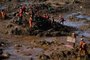  Rescuers search for vicitms near the town of Brumadinho, state of Minas Gerias, southeastern Brazil three days after the collapse of a dam at an iron-ore mine belonging to Brazil's giant mining company Vale on January 28, 2019. - A tsunami of toxic mud broke through a dam at an iron-ore mine owned by Vale on January 25. The official toll from the disaster was 58 dead and 305 missing as of late Sunday. (Photo by Mauro Pimentel / AFP)Editoria: DISLocal: BrumadinhoIndexador: MAURO PIMENTELSecao: accident (general)Fonte: AFPFotógrafo: STF