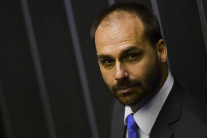  Sessão de posse dos deputados federais para a 56ª LegislaturaDeputado Eduardo Bolsonaro durante sessão de posse dos deputados federais para a 56a Legislatura.Marcelo Camargo/Agência Brasil