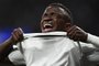 Real Madrids Brazilian forward Vinicius Junior reacts as he walks off the pitch after getting injured during the UEFA Champions League round of 16 second leg football match between Real Madrid CF and Ajax at the Santiago Bernabeu stadium in Madrid on March 5, 2019. (Photo by GABRIEL BOUYS / AFP)