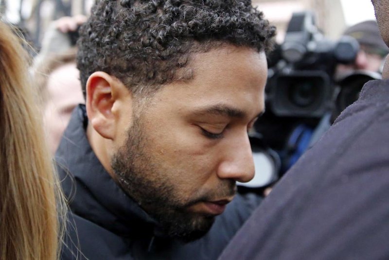 (FILES) In this file photo taken on February 21, 2019, Empire actor Jussie Smollett leaves Cook County jail after posting bond in Chicago. - A Chicago grand jury indicted American TV actor Jussie Smollett on 16 felony counts, after police accused him of staging a hate attack for personal gain, local media said Friday, March 8, 2019. (Photo by NUCCIO DINUZZO / GETTY IMAGES NORTH AMERICA / AFP)