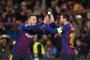 Barcelona's Argentinian forward Lionel Messi (R) celebrates with Barcelona's Brazilian midfielder Arthur after scoring during the UEFA Champions League round of 16, second leg football match between FC Barcelona and Olympique Lyonnais at the Camp Nou stadium in Barcelona on March 13, 2019. (Photo by Josep LAGO / AFP)