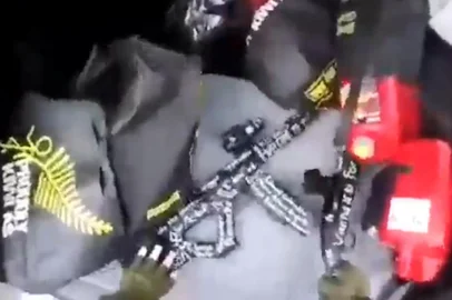 This image grab from a self-shot video that was streamed on Facebook Live on March 15, 2019 by the man who was involved in two mosque shootings in Christchurch shows the man reaching for guns from the boot of his car before he enters the Masjid al Noor mosque. - A "right-wing extremist" armed with semi-automatic weapons rampaged through two mosques in the quiet New Zealand city of Christchurch during afternoon prayers on March 15, killing 49 worshippers and wounding dozens more. (Photo by Handout / HANDOUT / AFP) / -----EDITORS NOTE --- RESTRICTED TO EDITORIAL USE - MANDATORY CREDIT "AFP PHOTO / HANDOUT" - NO MARKETING - NO ADVERTISING CAMPAIGNS - DISTRIBUTED AS A SERVICE TO CLIENTS - NO ARCHIVES