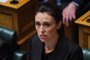 New Zealand Prime Minister Jacinda Ardern speaks during the Parliament session in Wellington on March 19, 2019. - Ardern vowed never to utter the name of the twin-mosque gunman as she opened a sombre session of parliament with an evocative as salaam alaikum message of peace to Muslims. (Photo by David LINTOTT / AFP)