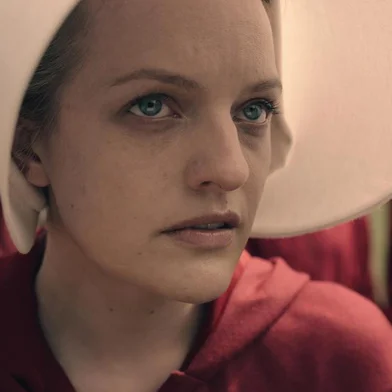 THE HANDMAIDS TALE -- The drama series, based on the award-winning, best-selling novel by Margaret Atwood, is the story of life in the dystopia of Gilead, a totalitarian society in what was formerly part of the United States. Facing environmental disasters and a plunging birthrate, Gilead is ruled by a fundamentalist regime that treats women as property of the state. As one of the few remaining fertile women, Offred (Elisabeth Moss) is a Handmaid in the Commanders household, one of the caste of women forced into sexual servitude as a last desperate attempt to repopulate a devastated world. In this terrifying society where one wrong word could end her life, Offred navigates between Commanders, their cruel Wives, domestic Marthas, and her fellow Handmaids – where anyone could be a spy for Gilead – all with one goal: to survive and find the daughter that was taken from her. Offred (Elisabeth Moss), shown. (Photo by: Take Five/Hulu)