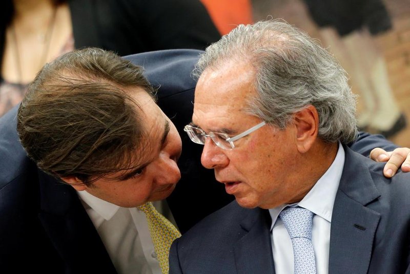 Brazils Lower House President Rodrigo Maia talks with Brazils Economy Minister Paulo Guedes during a session of the commission of the pension reform bill at the National Congress in BrasiliaBrazils Lower House President Rodrigo Maia talks with Brazils Economy Minister Paulo Guedes during a session of the commission of the pension reform bill at the National Congress in Brasilia, Brazil May 8, 2019. REUTERS/Adriano Machado ORG XMIT: GGGAHM20Local: BRASILIA ;BRAZIL