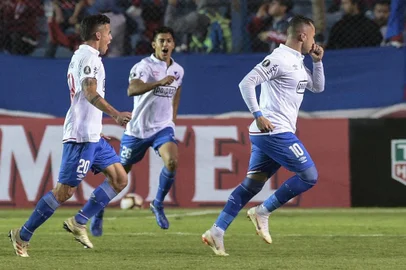  Uruguay's Nacional midfielder Rodrigo Amaral (R) celebrates after scoring a goal  during the Copa Libertadores football match against Uruguay's Nacional at the Gran Parque Central stadium in Montevideo, on May 7, 2019. (Photo by Miguel Rojo / AFP)Editoria: SPOLocal: MontevideoIndexador: MIGUEL ROJOSecao: soccerFonte: AFPFotógrafo: STR