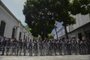 Members of Venezuelas Bolivarian National Police stand guard in the surroundings of the Federal Legislative Palace, which houses both the opposition-led National Assembly and the pro-government National Constituent Assembly, in Caracas on May 14, 2019. - Venezuelan opposition deputies denounced that with the excuse of searching for an explosive device inside the facilities, security forces blocked access to the National Assembly. National Guard troops, police and intelligence agents (SEBIN) remained in the building and its surroundings, according to the parliamentarians. (Photo by Ronaldo SCHEMIDT / AFP)