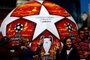  People pose with a giant replica of the UEFA Champions League ball displayed in Madrid on May 29, 2019 ahead of the final football match between Liverpool and Tottenham Hotspur on June 1. (Photo by GABRIEL BOUYS / AFP)Editoria: SPOLocal: MadridIndexador: GABRIEL BOUYSSecao: soccerFonte: AFPFotógrafo: STF