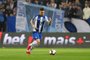  Porto's Brazilian defender Alex Telles celebrates a goal during the UEFA Champions League round of 16 second leg football match between FC Porto and AS Roma at the Dragao stadium in Porto on March 6, 2019. 