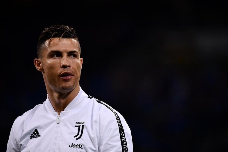 (FILES) In this file photo taken on April 27, 2019 Juventus' Portuguese forward Cristiano Ronaldo looks on prior to the Italian Serie A football match between Inter Milan and Juventus at the San Siro stadium in Milan. - Juventus star Cristiano Ronaldo has been served with court papers related to a rape lawsuit in the United States, according to documents filed by his lawyers on June 14, 2019. Five-time world player of the year Ronaldo is accused of rape by Kathryn Mayorga, who claims the Portuguese soccer star assaulted her in a Las Vegas hotel in 2009. (Photo by MARCO BERTORELLO / AFP)Editoria: SPOLocal: MilanIndexador: MARCO BERTORELLOSecao: soccerFonte: AFPFotógrafo: STF