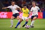 Brazils forward Marta (C) vies with Frances midfielder Gaetane Thiney (L) and Frances midfielder Amandine Henry (R) during the France 2019 Womens World Cup round of sixteen football match between France and Brazil, on June 23, 2019, at the Oceane stadium in Le Havre, north western France. (Photo by FRANCK FIFE / AFP)