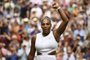US player Serena Williams celebrates beating US player Alison Riske during their womens singles quarter-final match on day eight of the 2019 Wimbledon Championships at The All England Lawn Tennis Club in Wimbledon, southwest London, on July 9, 2019. (Photo by Daniel LEAL-OLIVAS / AFP) / RESTRICTED TO EDITORIAL USE