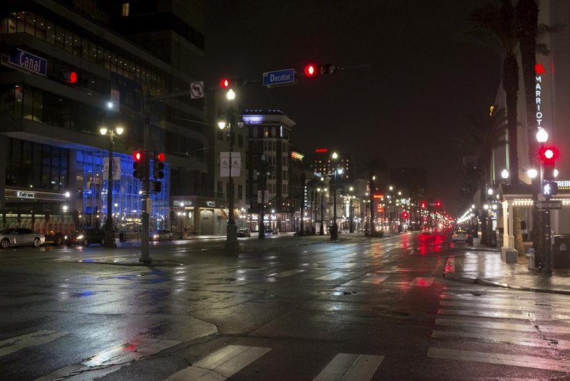 Canal Street is seen empty on Friday night in New Orleans, Louisiana July 12,2019 ahead of Tropical Storm Barry. - Barry is predicted to become a Category 1 hurricane before making landfall Saturday with maximum winds reaching 75 mph bringing with it heavy rain and possible storm surges. (Photo by Seth HERALD / AFP)