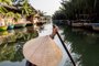 Within a half-hour drive of Hoi An, you can ride a basket boat through river channels.HOI AN, Vietnam ¿ BC-TRAVEL-TIMES-36-VIETNAM-ART-NYTSF ¿ Within a half-hour drive of Hoi An, you can ride a basket boat through river channels. Situated on the coast of central Vietnam, the former commercial port of Hoi An offers endless wonders, from fishermen launching bamboo basket boats along palm-fringed beaches, to farmers in conical hats harvesting rice in swathes of green paddies. But the marquee attraction is the well-preserved ancient town, brushed mustard yellow and festooned with colorful silk lanterns. (CREDIT: Justin Mott/The New York Times).. .--..ONLY FOR USE WITH ARTICLE SLUGGED -- BC-TRAVEL-TIMES-36-VIETNAM-ART-NYTSF -- OTHER USE PROHIBITED.Editoria: TRALocal: Hoi AnIndexador: Justin MottFonte: NYTNSFotógrafo: STR