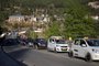  This photo taken on April 19, 2019 shows traffic backed up on a road in Bhutans capital Thimphu. - Famed for valuing Gross National Happiness over economic growth, Bhutan was a poster child for sustainable development, but a boom in car sales may jeopardise its rare status as a carbon negative country. (Photo by Upasana DAHAL / AFP) / TO GO WITH Bhutan-environment-transport-politics,FEATURE by Nidup GYELTSHENEditoria: ENVLocal: ThimphuIndexador: UPASANA DAHALSecao: road transportFonte: AFPFotógrafo: STR