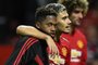 Manchester Uniteds Brazilian midfielder Fred (L) and Manchester Uniteds Belgian-born Brazilian midfielder Andreas Pereira gesture after the English Premier League football match between Manchester United and Leicester City at Old Trafford in Manchester, north west England, on August 10, 2018. / AFP PHOTO / Oli SCARFF / RESTRICTED TO EDITORIAL USE. No use with unauthorized audio, video, data, fixture lists, club/league logos or live services. Online in-match use limited to 120 images. An additional 40 images may be used in extra time. No video emulation. Social media in-match use limited to 120 images. An additional 40 images may be used in extra time. No use in betting publications, games or single club/league/player publications / 