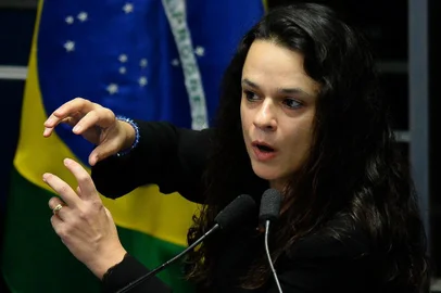 Brazilian jurist Janaina Paschoal, co-author of the complaint against suspended president Dilma Rousseff, speaks during the Senates debate impeachment trial against Rousseff at the National Congress in Brasilia, on August 30, 2016.Brazils suspended president Dilma Rousseff faces judgment Tuesday in a Senate vote expected to remove her from office despite her dramatic claim of being the victim of a coup. The countrys first female president confronted her accusers in a marathon session Monday, telling the Senate that she is innocent and warning that the Brazilian democracy is in danger. She is accused of having taken illegal state loans to patch budget holes in 2014, masking the countrys problems as it slid into its deepest recession in decades. / AFP PHOTO / ANDRESSA ANHOLETE