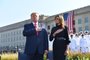 US President Donald Trump and First Lady Melania Trump listen to the national anthem during a ceremony marking the 18th anniversary of the 9/11 attacks, on September 11, 2019, at the Pentagon in Washington, DC. (Photo by Nicholas Kamm / AFP)