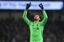  Liverpools Brazilian goalkeeper Alisson Becker celebrates their first goal during the English Premier League football match between Manchester City and Liverpool at the Etihad Stadium in Manchester, north west England, on January 3, 2019. (Photo by Oli SCARFF / AFP) / RESTRICTED TO EDITORIAL USE. No use with unauthorized audio, video, data, fixture lists, club/league logos or live services. Online in-match use limited to 120 images. An additional 40 images may be used in extra time. No video emulation. Social media in-match use limited to 120 images. An additional 40 images may be used in extra time. No use in betting publications, games or single club/league/player publications. / Editoria: SPOLocal: ManchesterIndexador: OLI SCARFFSecao: soccerFonte: AFPFotógrafo: STR