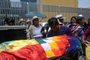 A relative mourns by the coffin -covered with a Bolivian national flag and a Wiphala- of a supporter of Bolivian ex-President Evo Morales killed during clashes with the police in Sacaba, Cochabamba, Bolivia, on November 16, 2019. - The UN rights chief voiced alarm Saturday at the deadly crisis in Bolivia, warning that excessive force by police was an extremely dangerous development. Morales resigned and fled to Mexico after losing the support of Bolivias security forces following weeks of protests over his disputed re-election that has seen 15 people killed and more than 400 wounded. (Photo by STR / AFP)