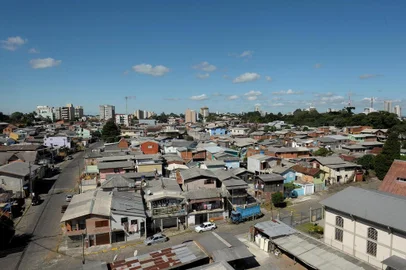  CAXIAS DO SUL, RS, BRASIL, 26/03/2019Bairro 1º de MaioO pleno do Superior Tribunal de Justiça (STJ) julga nesta quarta-feira (27) em Brasília se o município de Caxias do Sul pode ser responsabilizado pela invasão do terreno de 57 mil metros quadrados da família Magnabosco, ocorrida nos anos 1970, onde hoje fica o bairro Primeiro de Maio. Caso o município seja mantido como réu na ação, está sujeito a pagar uma indenização que supera os R$ 600 milhões, valor que foi crescendo com os juros e correções ao longo do tempo. (Lucas Amorelli/Agência RBS)