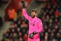  Liverpools Brazilian goalkeeper Alisson Becker gestures during the English Premier League football match between Southampton and Liverpool at St Marys Stadium in Southampton, southern England on April 5, 2019. (Photo by Glyn KIRK / AFP) / RESTRICTED TO EDITORIAL USE. No use with unauthorized audio, video, data, fixture lists, club/league logos or live services. Online in-match use limited to 120 images. An additional 40 images may be used in extra time. No video emulation. Social media in-match use limited to 120 images. An additional 40 images may be used in extra time. No use in betting publications, games or single club/league/player publications. / Editoria: SPOLocal: SouthamptonIndexador: GLYN KIRKSecao: soccerFonte: AFPFotógrafo: STR<!-- NICAID(14099926) -->
