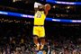 ATLANTA, GEORGIA - DECEMBER 15: LeBron James #23 of the Los Angeles Lakers dunks against the Atlanta Hawks in the first half at State Farm Arena on December 15, 2019 in Atlanta, Georgia. NOTE TO USER: User expressly acknowledges and agrees that, by downloading and/or using this photograph, user is consenting to the terms and conditions of the Getty Images License Agreement.   Kevin C. Cox/Getty Images/AFP