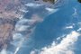  This NASA image obtained January 7, 2020 shows Wildfires pictured surrounding Sydney, Australia as the International Space Station orbited 269 miles above the Tasman Sea on January 3, 2020. - A global appeal to help Australian firefighters tackling catastrophic bushfires raised more than Aus$25 million on January 6, 2020, as swaths of the country suffered extensive damage and the death toll from the long-running crisis hit 24. East coast seaside towns were plunged into darkness, ash rained down on rural communities and major cities were again cloaked in choking smoke, even as stunned Australians tried to regroup amid a wave of cooler air and light rain. (Photo by Handout / NASA / AFP) / RESTRICTED TO EDITORIAL USE - MANDATORY CREDIT AFP PHOTO /NASA/HANDOUT  - NO MARKETING - NO ADVERTISING CAMPAIGNS - DISTRIBUTED AS A SERVICE TO CLIENTSEditoria: DISLocal: In spaceIndexador: HANDOUTSecao: fireFonte: NASAFotógrafo: STR<!-- NICAID(14379487) -->