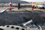 EDITORS NOTE: Graphic content / Rescue teams recover debris from a field after a Ukrainian plane carrying 176 passengers crashed near Imam Khomeini airport in the Iranian capital Tehran early in the morning on January 8, 2020, killing everyone on board. - The Boeing 737 had left Tehrans international airport bound for Kiev, semi-official news agency ISNA said, adding that 10 ambulances were sent to the crash site. (Photo by - / )