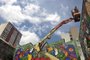  Grafiteiros Fábio Panone Lopes e Henrique Padilha trabalham na segunda parte daquele que será o maior mural a céu aberto de Caxias(Lucas Amorelli/Agência RBS)