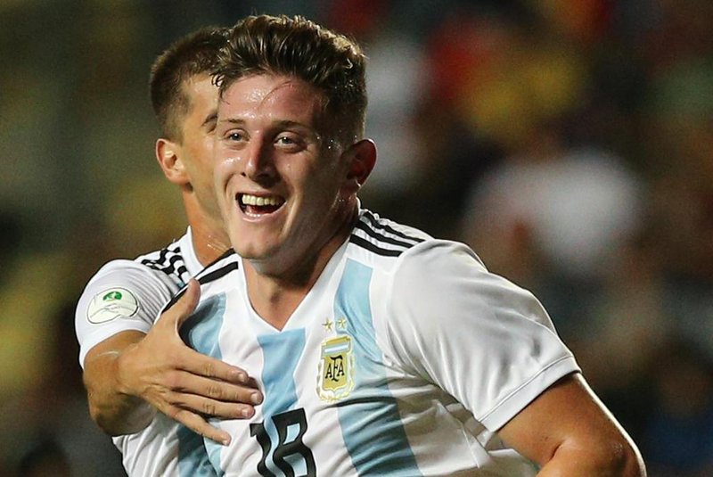 (FILES) In this file photo taken on February 04, 2019, Argentina's Adolfo Gaich (front) celebrates with teammates after scoring against Venezuela during their South American U-20 football match at El Teniente stadium in Rancagua, Chile. - Gaich will participate in the Under-23 South American Pre-Olympic Tournament taking place in the Colombian cities of Armenia, Bucaramanga and Pereira between January 18 and February 9, 2020. (Photo by CLAUDIO REYES / AFP)<!-- NICAID(14391244) -->