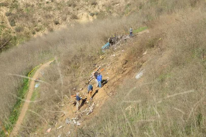  CALABASAS, California (Jan. 28, 2020) ¿ The extent of the debris field from the Jan. 26, crash of a Sikorsky S76B helicopter near Calabasas, California, can be seen in this photo taken Jan. 27. Documentation of the debris field is a standard practice in NTSB crash investigations. The eight passengers and pilot aboard the helicopter were fatally injured and the helicopter was destroyed. (NTSB photo by James Anderson)<!-- NICAID(14404140) -->