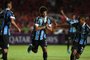  Brazil's Gremio defender Victor Ferraz (C) celebrates with teammates after scoring against Colombia's America de Cali during their Copa Libertadores football match at Pascual Guerrero Stadium in Cali, Colombia, on March 3, 2020. (Photo by LUIS ROBAYO / AFP)Editoria: SPOLocal: CaliIndexador: LUIS ROBAYOSecao: soccerFonte: AFPFotógrafo: STF<!-- NICAID(14439167) -->