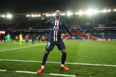  This handout photograph taken and released by the UEFA on March 11, 2020, shows  Paris Saint-Germains Brazilian forward Neymar celebrating after winning the   UEFA Champions League round-of-16 second leg football match between Paris Saint-Germain (PSG) and Borussia Dortmund at the Parc des Princes stadium in Paris. - The match is held behind closed doors due to the spread of COVID-19, the new coronavirus. (Photo by - / GETTY/UEFA / AFP) / RESTRICTED TO EDITORIAL USE - MANDATORY CREDIT AFP PHOTO / GETTY / UEFA - NO MARKETING NO ADVERTISING CAMPAIGNS - DISTRIBUTED AS A SERVICE TO CLIENTSEditoria: SPOLocal: ParisIndexador: -Secao: soccerFonte: GETTY/UEFAFotógrafo: Handout<!-- NICAID(14447984) -->