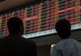 Em dia de alívio, dólar cai para R$ 5,097 e Bolsa sobe 2%