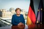 This Handout photo made available by the German governments press office shows German Chancellor Angela Merkel posing for a photo at the recording of a TV address to the nation on the spread of the new coronavirus COVID-19 at the Chancellery, with a view of the Reichstag, the building housing the lower house of parliament, through the window in Berlin on March 18, 2020. (Photo by Steffen Kugler / Bundesregierung / AFP) / RESTRICTED TO EDITORIAL USE - MANDATORY CREDIT AFP PHOTO /  BUNDESREGIERUNG / STEFFEN KUGLER - NO MARKETING - NO ADVERTISING CAMPAIGNS - DISTRIBUTED AS A SERVICE TO CLIENTS  - NO ARCHIVES<!-- NICAID(14455334) -->