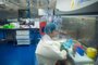 (FILES) This file photo taken on February 23, 2017 shows a worker inside the P4 laboratory in Wuhan, capital of Chinas Hubei province. - The P4 epidemiological laboratory was built in co-operation with French bio-industrial firm Institut Merieux and the Chinese Academy of Sciences. The facility is among a handful of labs around the world cleared to handle Class 4 pathogens (P4) - dangerous viruses that pose a high risk of person-to-person transmission. (Photo by JOHANNES EISELE / AFP)<!-- NICAID(14481352) -->