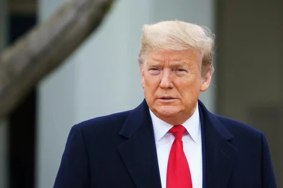 US President Donald Trump is seen before the start of a Fox News virtual town hall meeting from the Rose Garden of the White House in Washington, DC on March 24, 2020. (Photo by MANDEL NGAN / AFP)