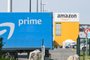 An Amazon delivery lorry is parked outside the Amazon logistics centre in Lauwin-Planque, northern France, on April 16, 2020. - Amazon France said on April 16, 2020, it did not know when it would reopen its distribution centres, shuttered after a court ordered it to limit deliveries to essential goods pending a review of anti-coronavirus safety measures for its staff. (Photo by DENIS CHARLET / AFP)<!-- NICAID(14482505) -->