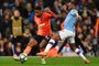 Manchester City's English midfielder Raheem Sterling (R) challenges Shakhtar Donetsk's Brazilian forward Tete (L) during the UEFA Champions League football Group C match between Manchester City and Shakhtar Donetsk at the Etihad Stadium in Manchester, north west England on November 26, 2019. (Photo by Paul ELLIS / AFP)