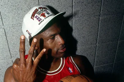 PHOENIX - JUNE 20:  Michael Jordan #23 of the Chicago Bulls celebrates winning the NBA Championship after Game Six of the 1993 NBA Finals on June 20, 1993 at th America West Arena in Phoenix, Arizona.  The Bulls won 99-98.  NOTE TO USER: User expressly acknowledges and agrees that, by downloading and/or using this Photograph, user is consenting to the terms and conditions of the Getty Images License Agreement. Mandatory Copyright Notice: Copyright 1993 NBAE  (Photo by Andrew D. Bernstein/NBAE via Getty Images)<!-- NICAID(14498754) -->