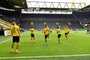Dortmund's Norwegian forward Erling Braut Haaland (L) celebrates with team players after scoring the opening goal during the German first division Bundesliga football match BVB Borussia Dortmund v Schalke 04 on May 16, 2020 in Dortmund, western Germany as the season resumed following a two-month absence due to the novel coronavirus COVID-19 pandemic. (Photo by Martin Meissner / POOL / AFP) / DFL REGULATIONS PROHIBIT ANY USE OF PHOTOGRAPHS AS IMAGE SEQUENCES AND/OR QUASI-VIDEO<!-- NICAID(14501646) -->