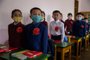  Primary school children wearing face masks as a protective measure against the COVID-19 novel coronavirus attend a class at Hasin Primary School in Sosong District in Pyongyang following the re-opening of schools on June 3, 2020. (Photo by KIM Won Jin / AFP)Editoria: HTHLocal: PyongyangIndexador: KIM WON JINSecao: diseaseFonte: AFPFotógrafo: STF<!-- NICAID(14514121) -->