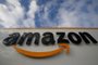 (FILES) A file photo taken on November 28, 2019  shows the Amazon logo at one of the company's centre in Bretigny-sur-Orge. - Masks for all French employees, temperature control throughout the network: the American giant of online retail group Amazon reacted on April 3, 2020 to the grumbling of its employees, without really calming concerns over the coronavirus epidemic. (Photo by Thomas SAMSON / AFP)<!-- NICAID(14474509) -->