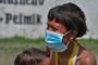EDITORS NOTE: Graphic content / A Yanomami indigenous woman wearing a face mask breastfeeds her baby at a Special Border Platoon, where tests for COVID-19 are being carried out, in the indigenous land of Surucucu, in Alto Alegre, Roraima state, Brazil, on July 1, 2020, amid the new coronavirus pandemic. (Photo by NELSON ALMEIDA / AFP)<!-- NICAID(14543246) -->