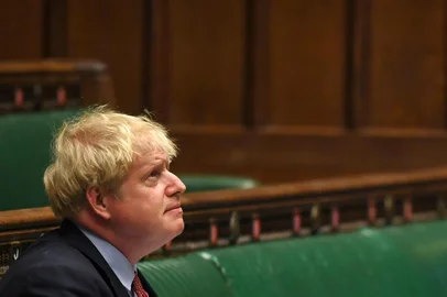 A handout photograph released by the UK Parliament shows Britains Prime Minister Boris Johnson during Prime Ministers Questions (PMQs) in the House of Commons in London on July 15, 2020. (Photo by JESSICA TAYLOR / various sources / AFP) / RESTRICTED TO EDITORIAL USE - MANDATORY CREDIT  AFP PHOTO / UK PARLIAMENT  - NO USE FOR ENTERTAINMENT, SATIRICAL, MARKETING OR ADVERTISING CAMPAIGNS - EDITORS NOTE THE IMAGE HAS BEEN DIGITALLY ALTERED AT SOURCE TO OBSCURE VISIBLE DOCUMENTS<!-- NICAID(14547441) -->