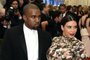 Kim Kardashian and Kanye West  attend the Costume Institute Benefit at The Metropolitan Museum of Art May 6, 2013, celebrating the opening of Punk: Chaos to Couture.  AFP PHOTO / TIMOTHY A. CLARY<!-- NICAID(9355348) -->
