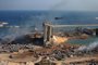  A general view shows the damaged grain silos of Beiruts harbour and its surroundings on August 5, 2020, one day after a powerful twin explosion tore through Lebanons capital, resulting from the ignition of a huge depot of ammonium nitrate at the citys main port. - Rescuers searched for survivors in Beirut after a cataclysmic explosion at the port sowed devastation across entire neighbourhoods, killing more than 100 people, wounding thousands and plunging Lebanon deeper into crisis. The blast, which appeared to have been caused by a fire igniting 2,750 tonnes of ammonium nitrate left unsecured in a warehouse, was felt as far away as Cyprus, some 150 miles (240 kilometres) to the northwest. (Photo by STR / AFP)Editoria: DISLocal: BeirutIndexador: STRSecao: explosionFonte: AFPFotógrafo: STR<!-- NICAID(14561199) -->